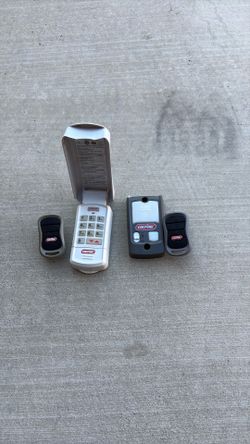Genie garage door controls and key pad and wall mount control