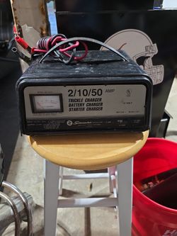 SCHUMACHER 2/10/50 AMP  BATTERY TRICKLE,  BATTERY, & STARTER CHARGER.