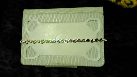 Multi stone .925 sterling silver bracelet.