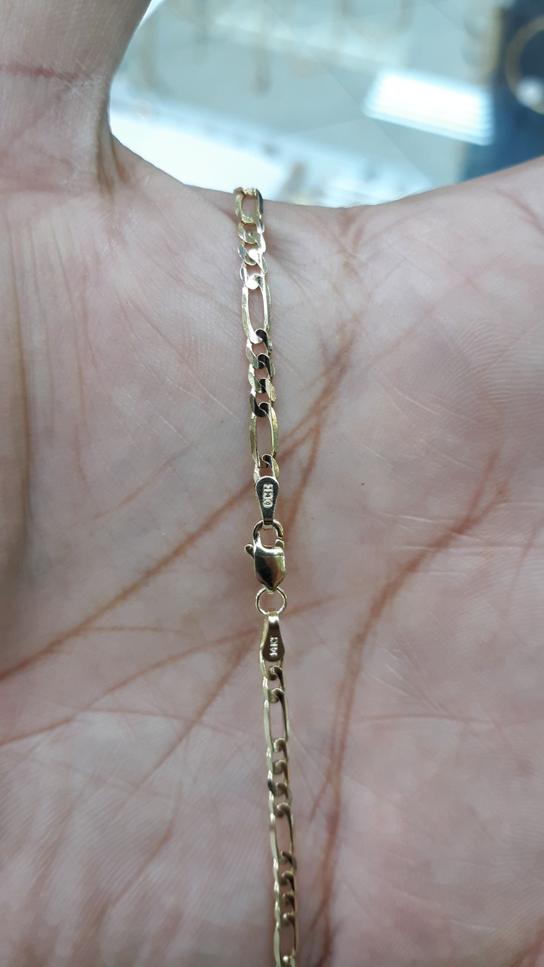 14k gold Figaro link chain 24 inch 7.4 grams 2mm