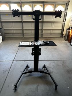 Mobile PC workstation for dual monitors with keyboard tray and CPU holder.  Adjustable.