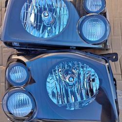 01-04 Nissan Frontier Headlights Luces Focos Micas Faros Faroles Headlamps 