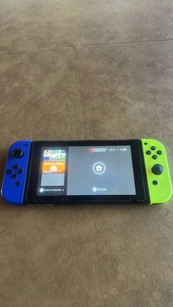Nintendo Switch with Blue and Neon Yellow Joy-Cons