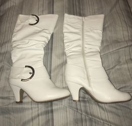 White leather boots with a little heel