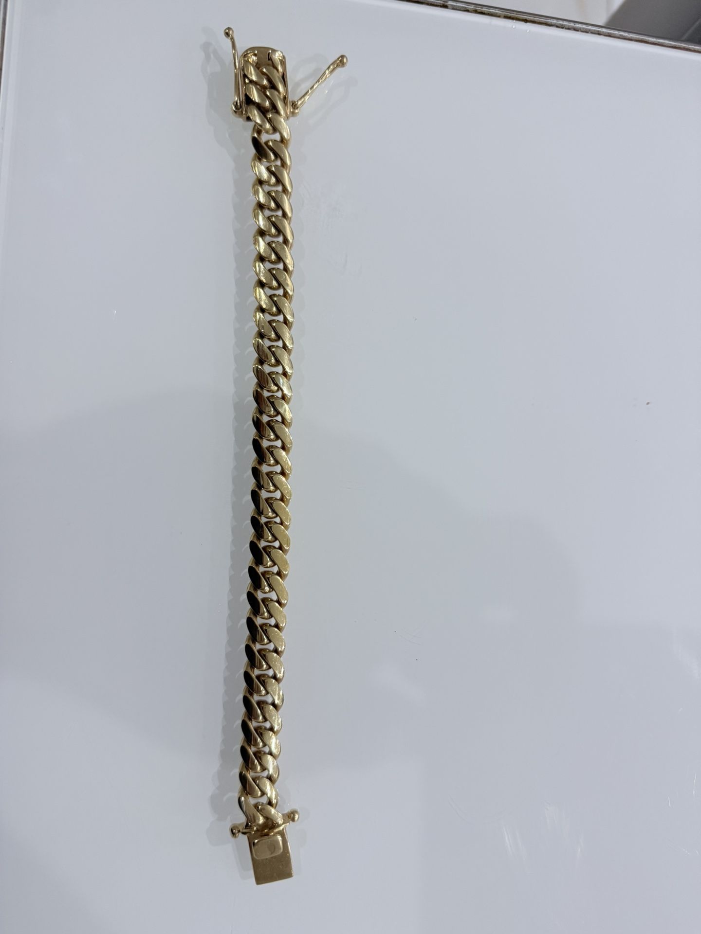 Cuban Bracelet 14k Gold Over Silver.