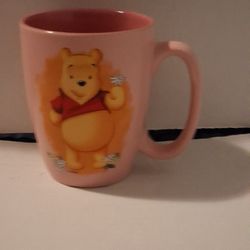 Nice Disney Store Winnie the Pooh Holding A Flower Mug 
