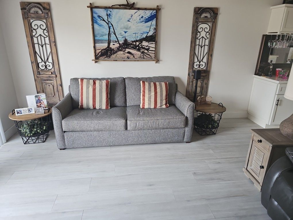 Gray Couch with pull out Queen bed and thermopedic  matress