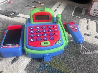 Toy register with scanner and speaker