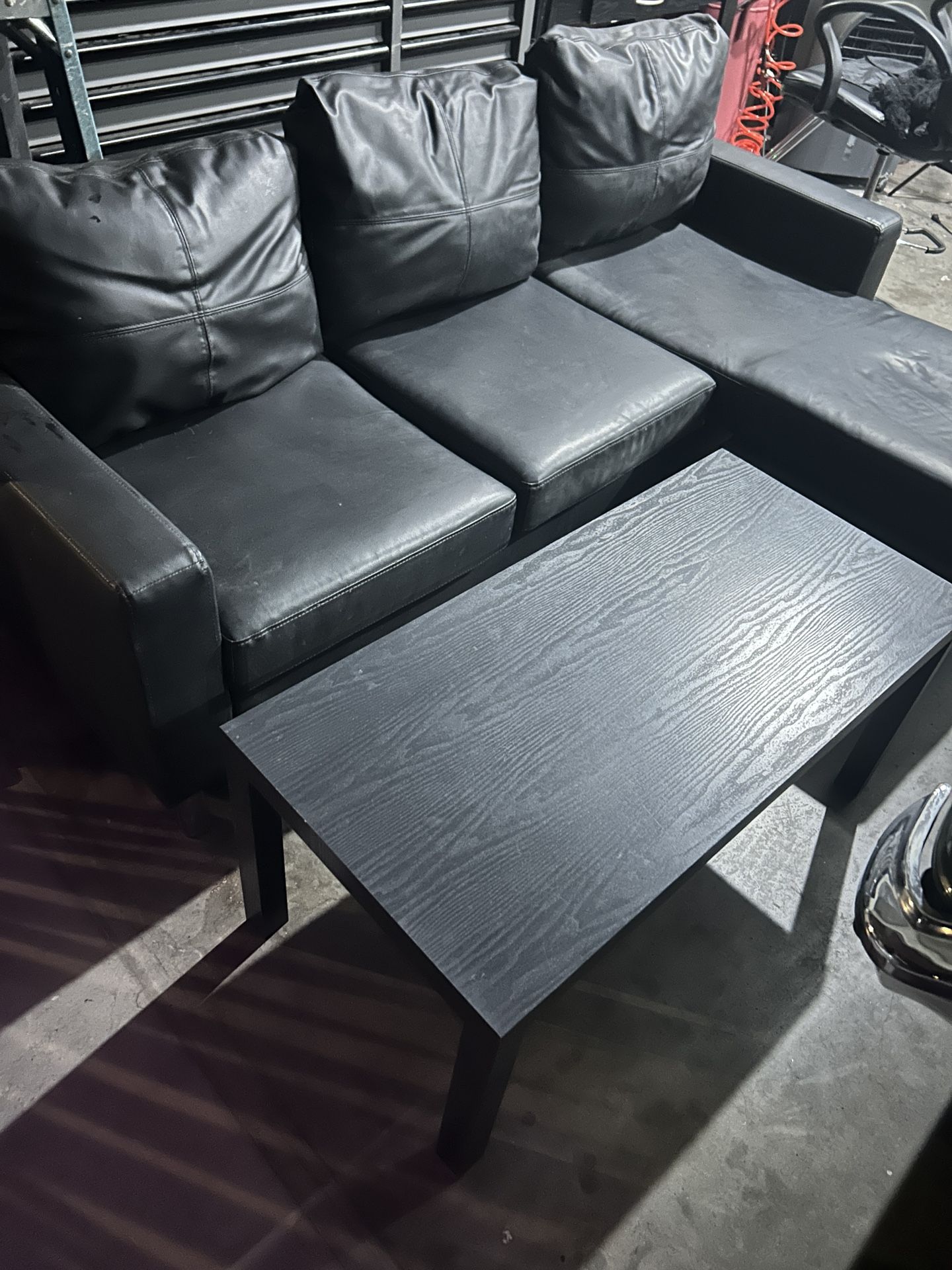 black leather couch ottoman