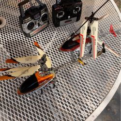 Two helicopters with controllers