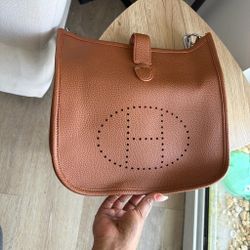 Tan cross body bag