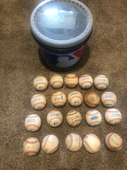 Bucket of 20 used baseballs