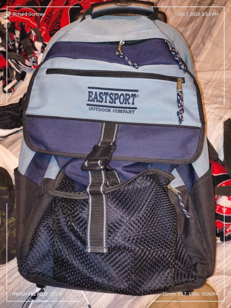 East sports outdoor Company backpack and roller bag