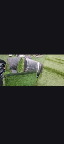 Artificial grass$ 100 a roll 2ft wide and 13-14 wide nothing bigger only size
