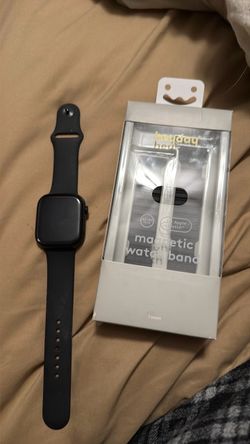 Apple Watch with charger and band
