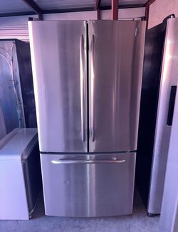 GE Stainless Steel Refrigerator And Freezer