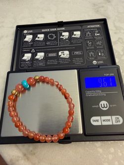 beaded gemstone bracelet featuring orange-red chalcedony / carnelian