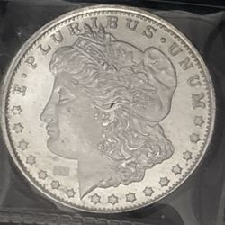 Morgan Silver Dollar Coin round below spot