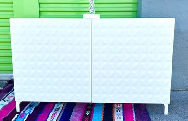 White Two-Door Cabinet with Textured Front