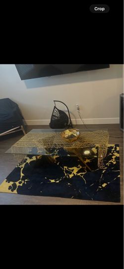 Glass coffee table and rug