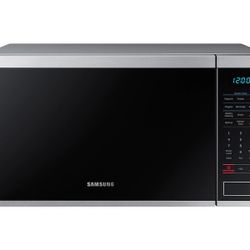 New in box Countertop Microwave 1.4 cu. ft.  with Sensor Cooking in Stainless Steel