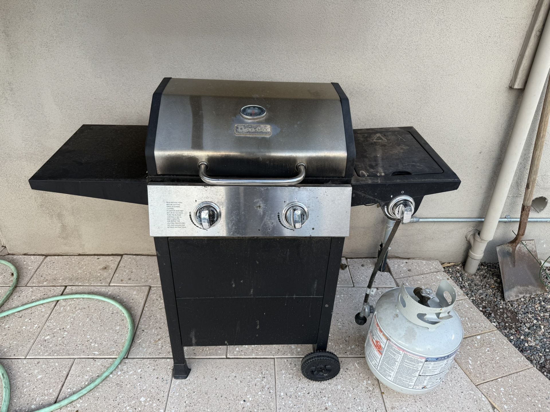 Two Burner Grill With Empty Propane Tank