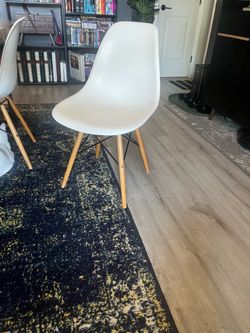 4 plastic mid century styled chairs