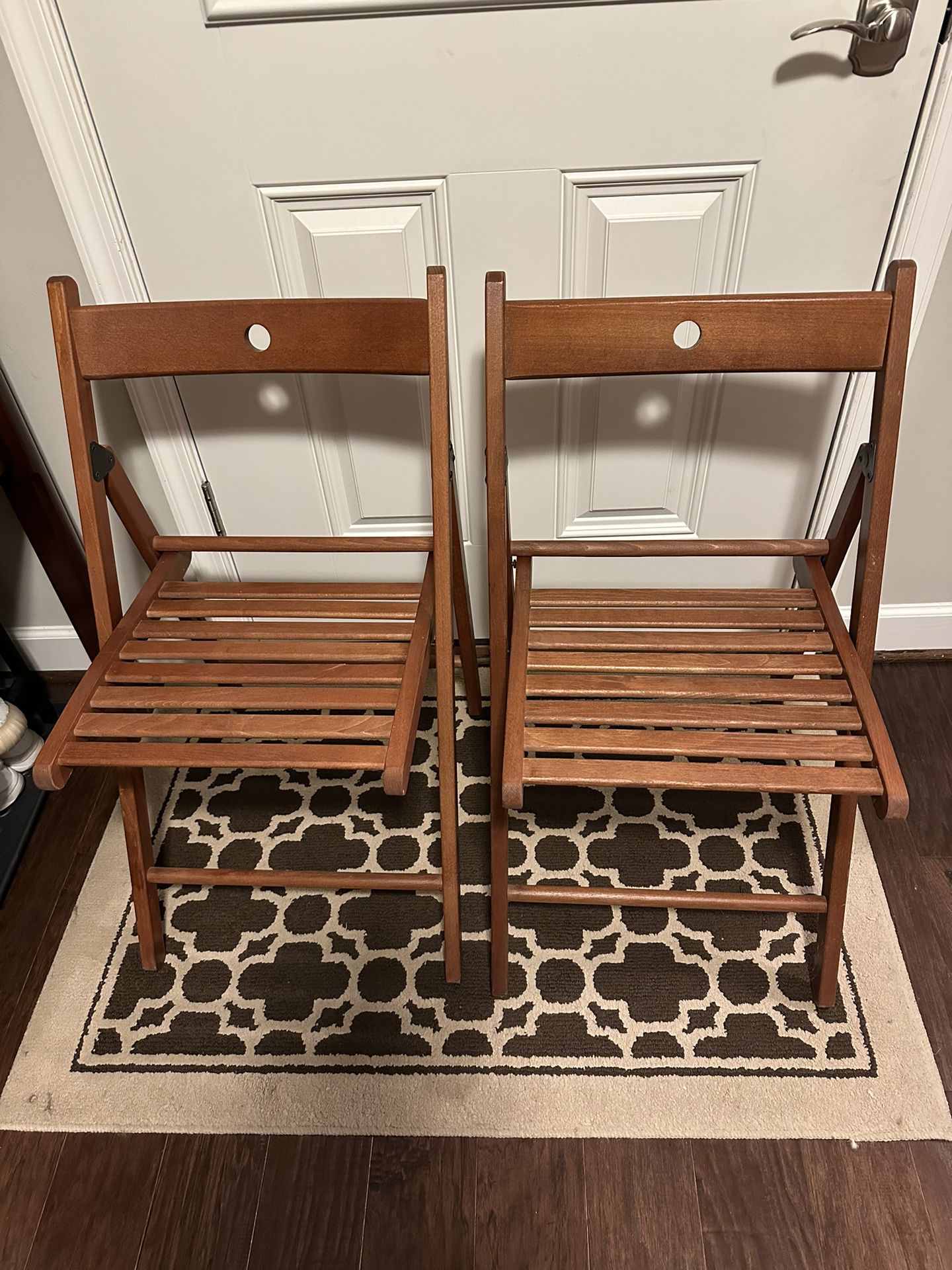 set of 2 wooden (teak?) foldable chairs