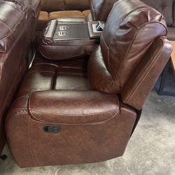 Brand new reclining leather like sofa and loveseat for only $2000 grab and go