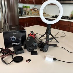 MUST GO Canon EOS R100 Creator Bundle (2 Mos Old) – 4K Camera, Ring Light, 128GB SD & More! 