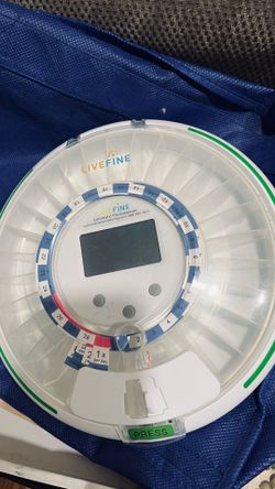 Older model Live Fine automatic pill dispenser