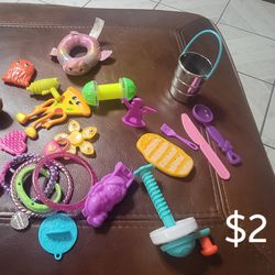 Misc plastic toys, bracelets, doll hair brush
, mermaid mold, plastic super bowl ring

Harlingen near Walmart 

Antiques, Telephones & Flags