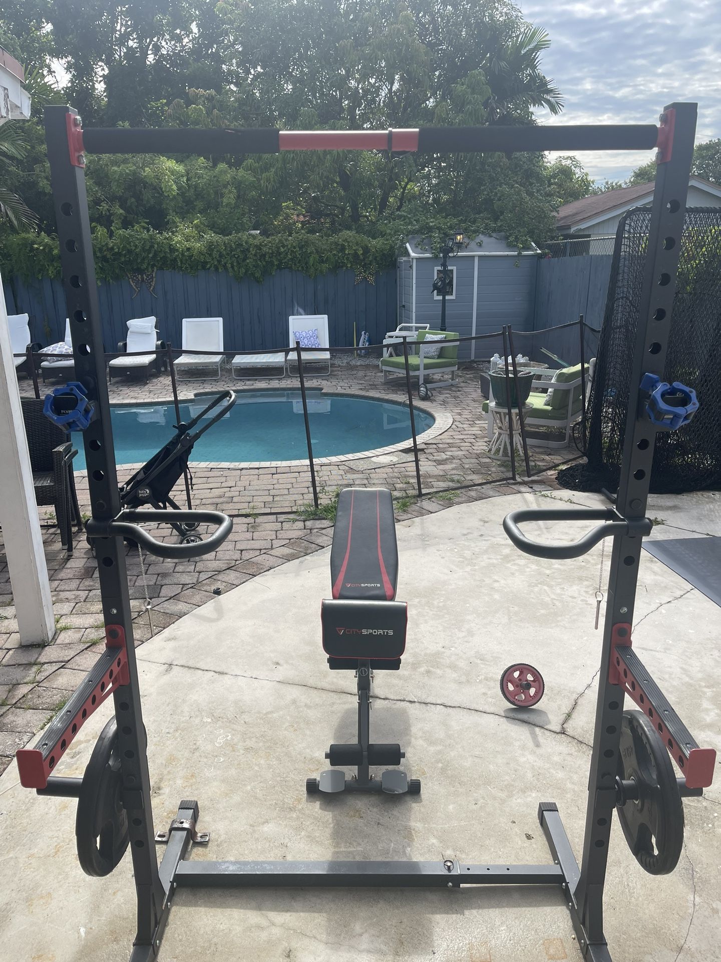 Squat Rack With Bench, Dip Handle Bars, And Weight Holders