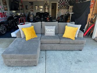 Absolutely perfect gray reversible chase sectional couch !!