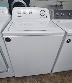 AMANA WASHER MACHINE.
