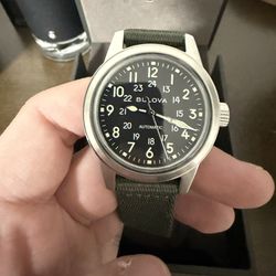 Bulova Men's Military Heritage Hack Veteran's Watchmaking Initiative Watch in Stainless Steel with 3-Hand Automatic, Green NATO Strap Style