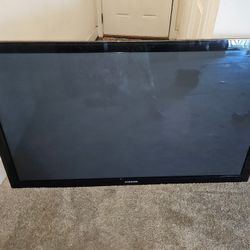 70’ Tv with Glass Stand 