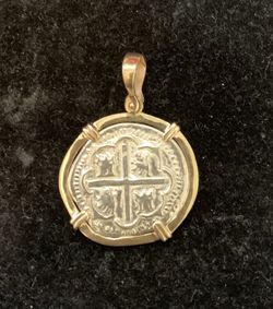 Atocha silver coin pendant in gold bezel
