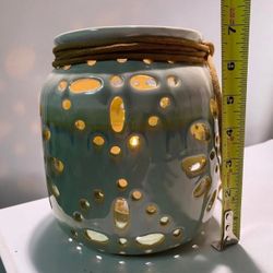 Gorgeous ceramic Glazed Orchid Pot /Planter.  can be used as a candle holder with see through holes.