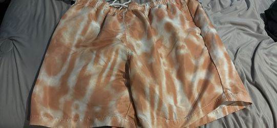 Orange and white shorts mesh size small