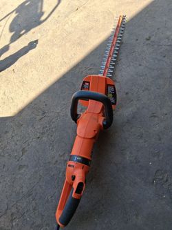 24 in. 3.3 Amp Corded Dual Action Electric Hedge Hog Trimmer with Rotating Handle