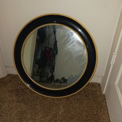 2 ft round black and gold wall mirror $25 cash must pick up Broadway and apache buckeye AZ