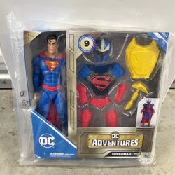 DC Comics, Superman Man of Steel Action Figure, DC Adventures, 12-inch, 9 Accessories, Collectible