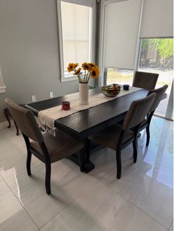 Dining table with 4 chairs and bench
