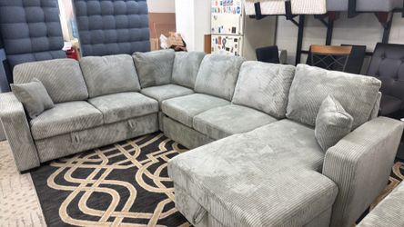 New sleeper sectional couch with storage / free delivery