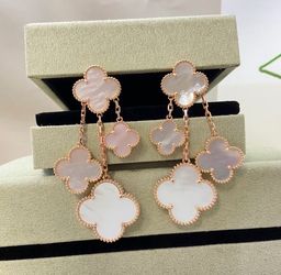 VC white mother of pearl earrings with gold detailing - New