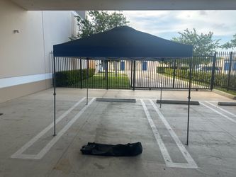 Canopy shelter 10 by 10 feet wide of shade with air trap on top  popup ajustable heights like new $85