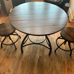 Adjustable Table With Stools