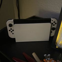 Nintendo Switch OLED With Controllers And Games
