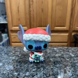 Funko Pop Disney Santa Stitch with Scrump #983 Hot Topic Exclusive Lilo & Stitch.  No box.  Has been on display in a cabinet with a Funko Pop Collecti